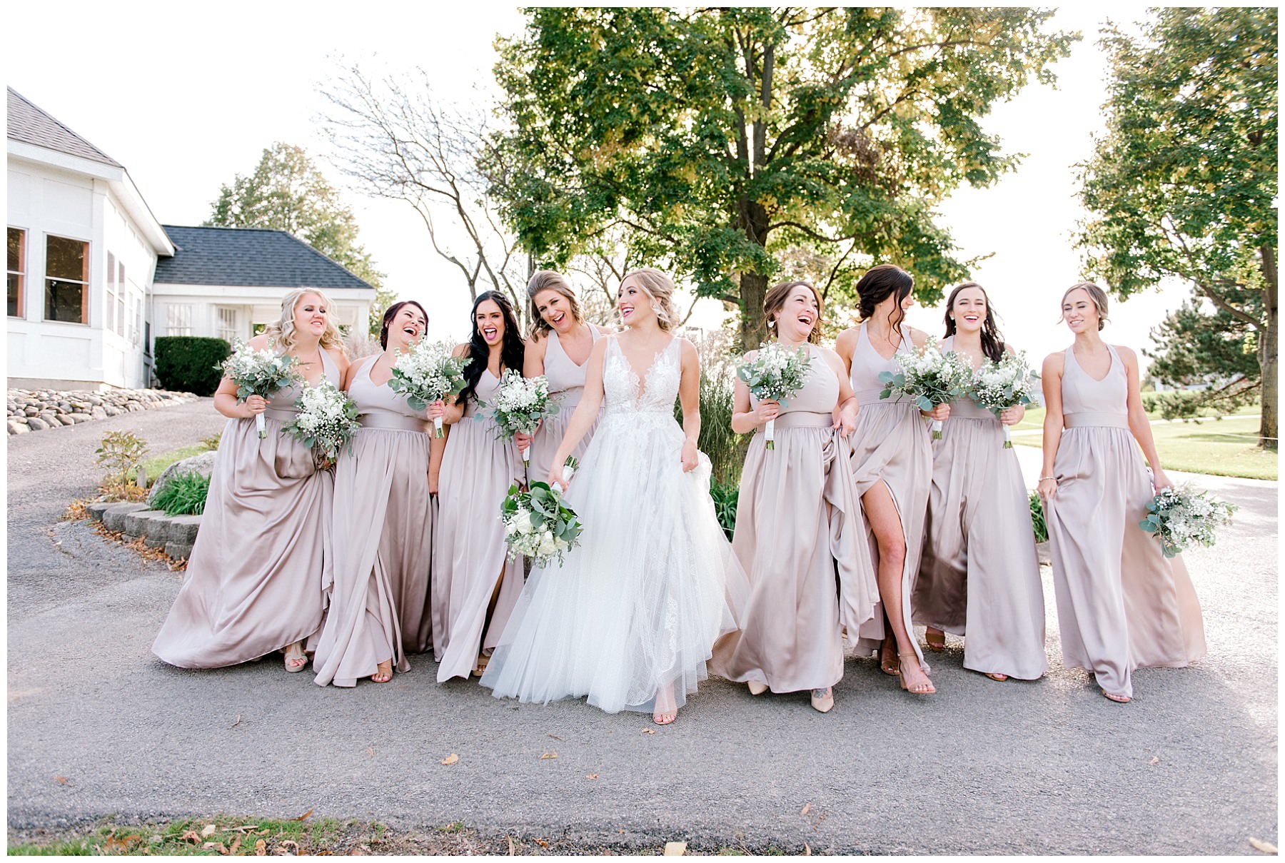 bride walking and laughing with her bridesmaids at white eagle golf club naperville