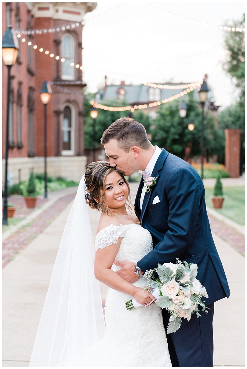 bride and groom wedding photos at the Jacob Henry Mansion in Joliet