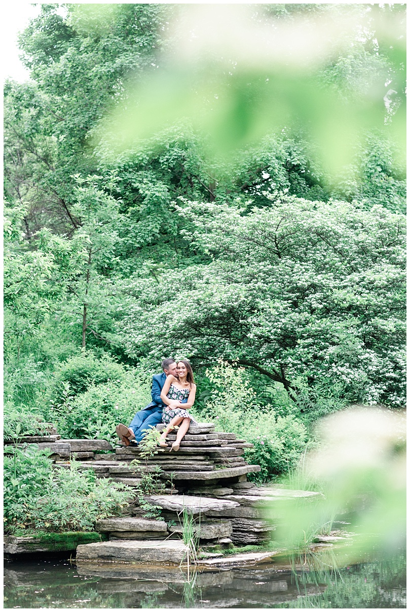 photo of a boy and girl during their engagement session at the Lily Pond in Lincoln Park Chicago